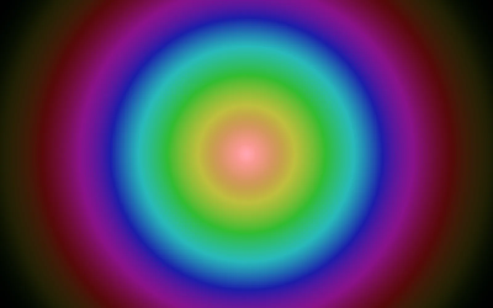 Iris: concentric rings of rainbow color around a pale pink center, fading to black at the corners of the frame