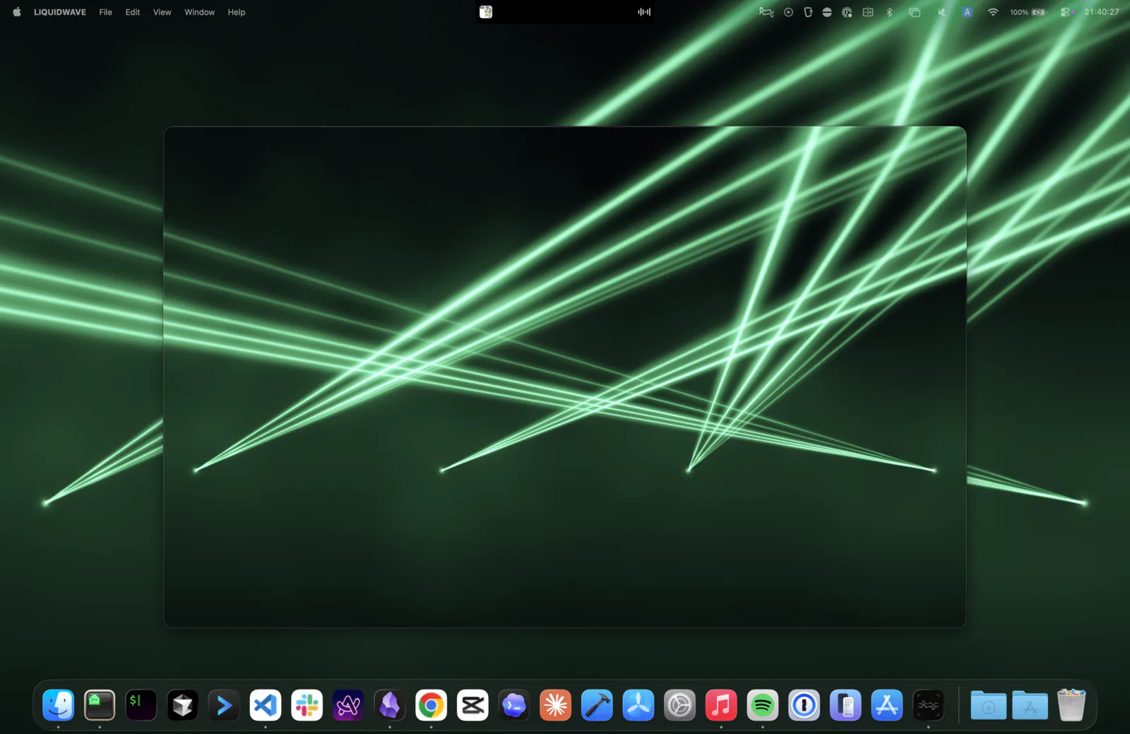 Desktop Mode on a Mac: LIQUIDWAVE's Laser scene firing across the desktop behind an open window, between the menu bar and the Dock