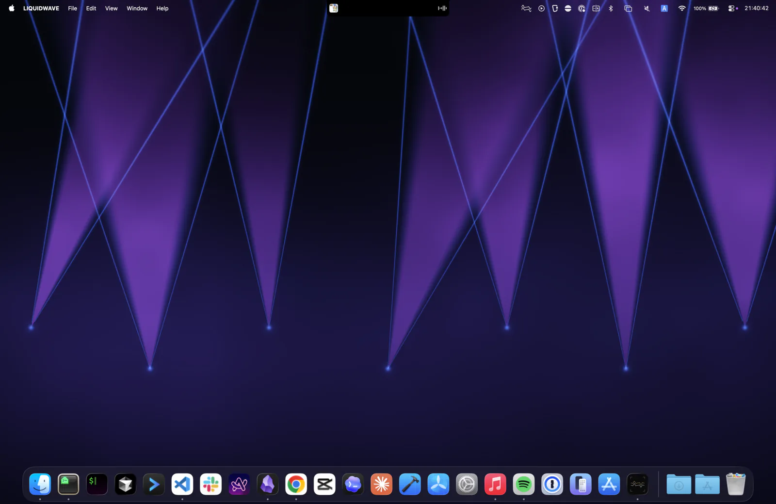Violet stage-light beams filling the whole Mac desktop in Desktop Mode, with the menu bar and the Dock left as they are